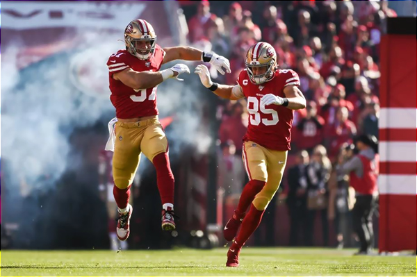 Joey Bosa and George Kittle.JPG